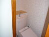 TOTOピュアレストQR パステルピンク　クロス・クッションフロアーをかえ、優しい色合いの既存より広いトイレになりました